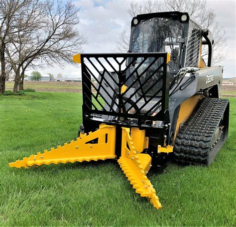 mini skid steer post puller|skid loader tree puller.